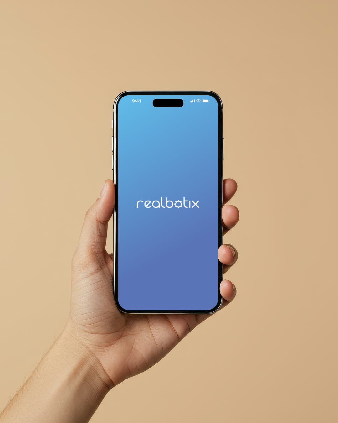 A hand holding a phone showing the Realbotix App